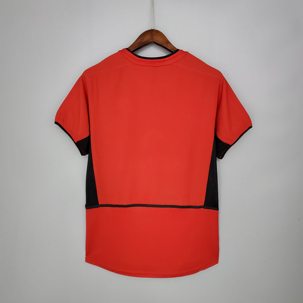 Camiseta Manchester United Local 02-04 trasera